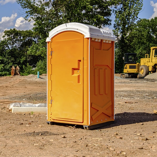 how often are the portable restrooms cleaned and serviced during a rental period in Wyndham